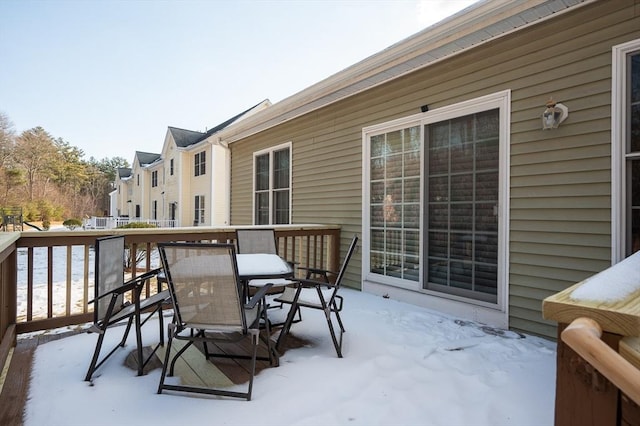 view of snow covered deck