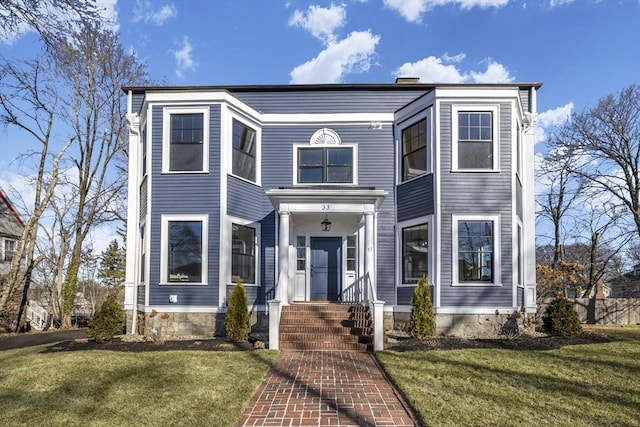 view of front of home with a front yard