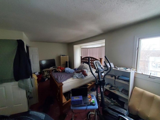 bedroom featuring a textured ceiling