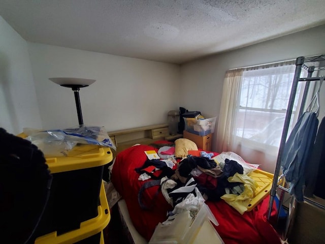 bedroom featuring a textured ceiling