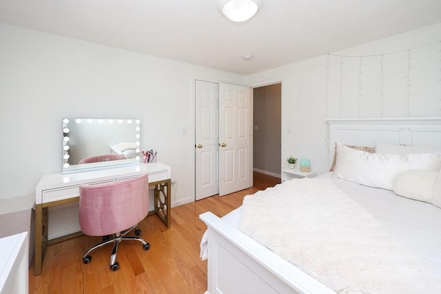 bedroom with light wood-type flooring