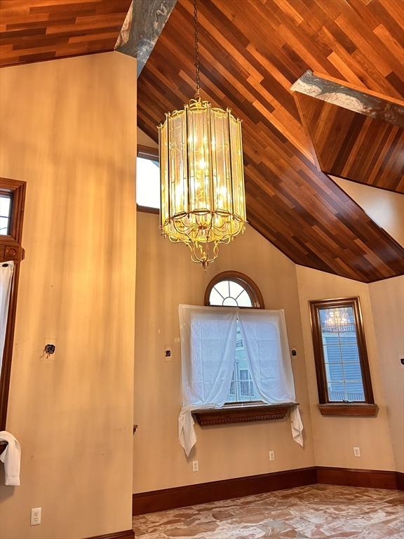 39R Spring St, Boston, MA 02132 - entrance foyer with lofted ceiling, a chandelier, and wood ceiling