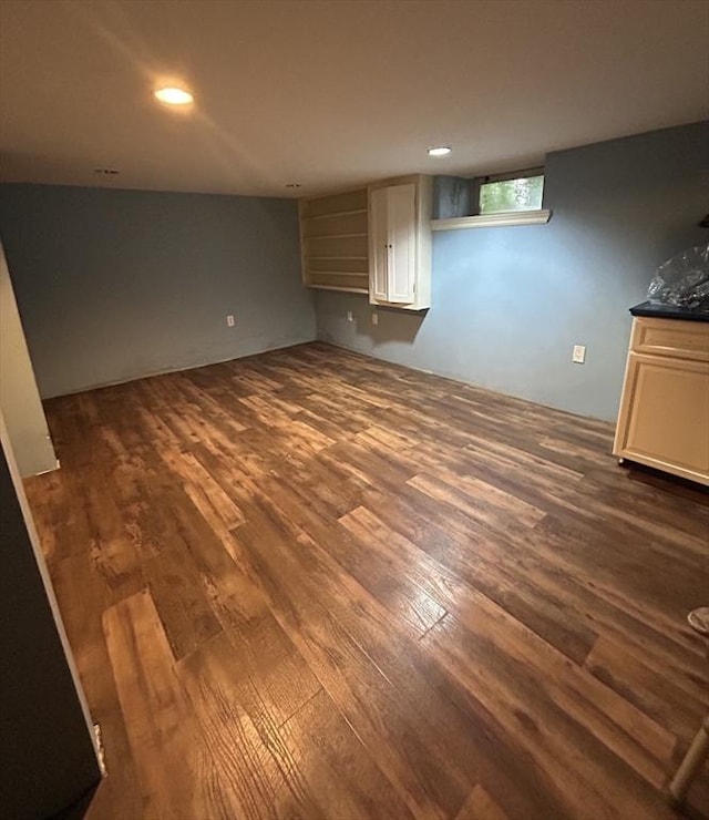 39R Spring St, Boston, MA 02132 - unfurnished living room featuring dark wood-style floors and recessed lighting