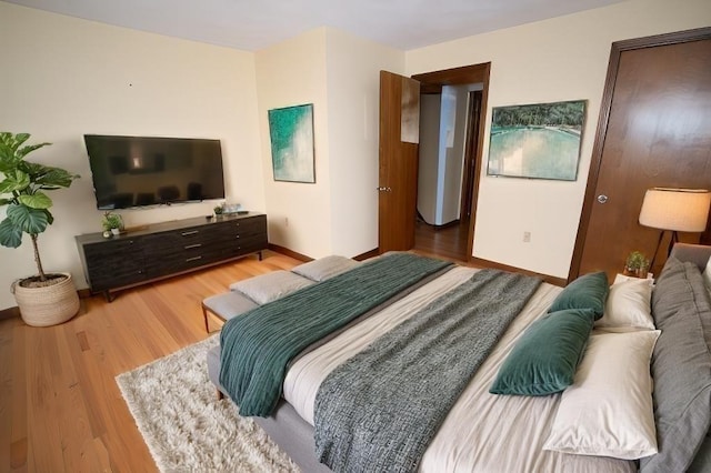 bedroom with wood-type flooring