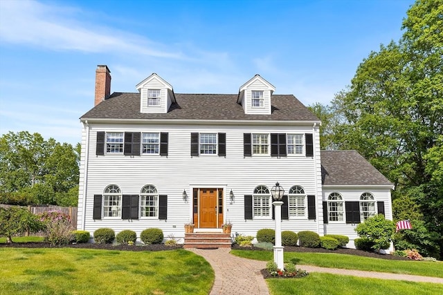 38 Thoreau Cir, Beverly, MA 01915 - view of front of house featuring a chimney and a shingled roof
