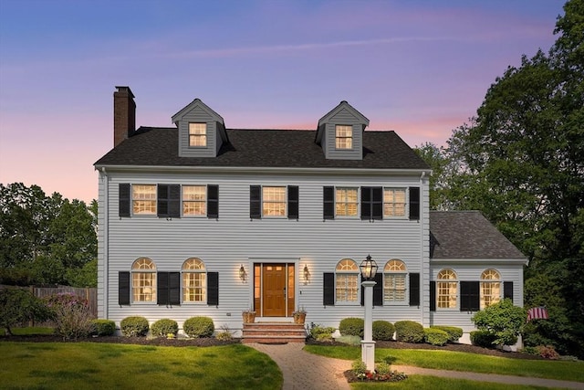 38 Thoreau Cir, Beverly, MA 01915 - view of front of home with a chimney, a front lawn, and a shingled roof