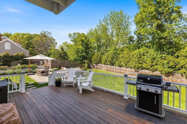 38 Thoreau Cir, Beverly, MA 01915 - wooden terrace featuring area for grilling and outdoor dining space