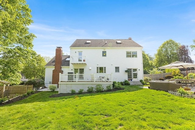 38 Thoreau Cir, Beverly, MA 01915 - back of property featuring a chimney, a deck, and outdoor lounge area