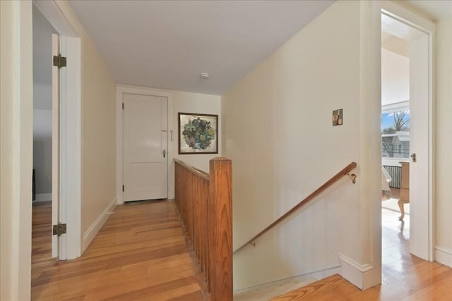 hall with light wood-type flooring