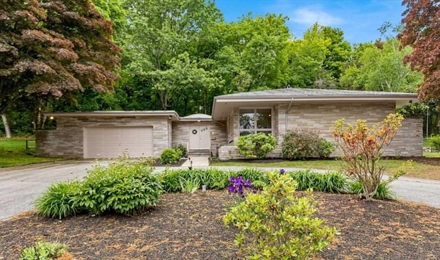 124 Mount Vernon Rd W, Weymouth, MA 02189 - view of front of house with driveway and a garage