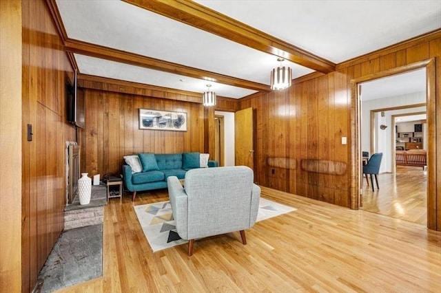 124 Mount Vernon Rd W, Weymouth, MA 02189 - living area with wood finished floors, beam ceiling, and wooden walls