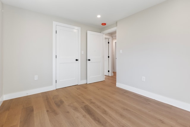 unfurnished bedroom featuring light hardwood / wood-style flooring