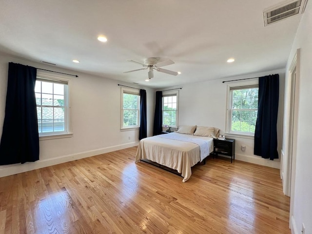 141 Pearl St Unit 141, Newton, MA 02458 - bedroom featuring multiple windows, light wood-style floors, recessed lighting, and ceiling fan