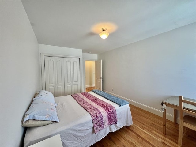 141 Pearl St Unit 141, Newton, MA 02458 - bedroom with a closet and wood finished floors