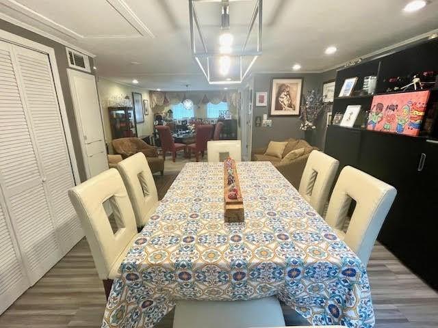 dining space featuring hardwood / wood-style flooring