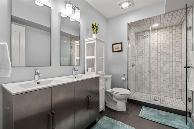 150 W Broadway Unit 203, Boston, MA 02127 - bathroom featuring a shower stall, double vanity, and tile patterned flooring