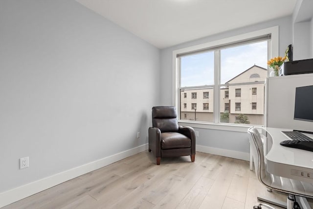 150 W Broadway Unit 203, Boston, MA 02127 - office area with light wood-style flooring and vaulted ceiling