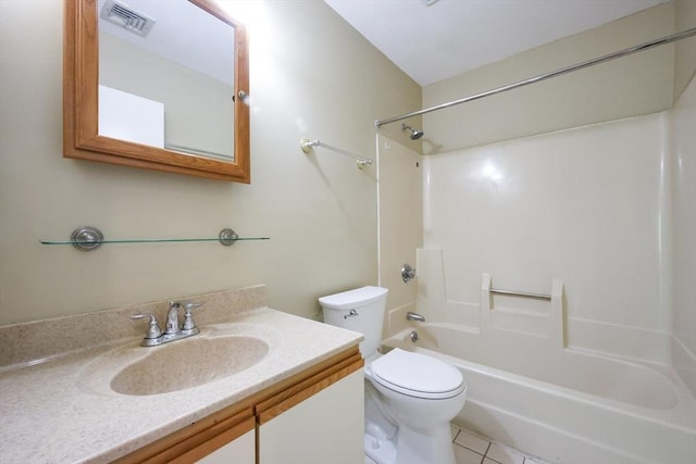 bathroom featuring vanity, toilet, tile patterned flooring, and  shower combination