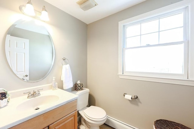 half bathroom featuring a baseboard radiator, toilet, baseboard heating, and vanity