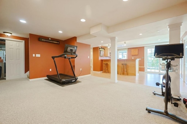 workout area with recessed lighting, baseboards, and carpet