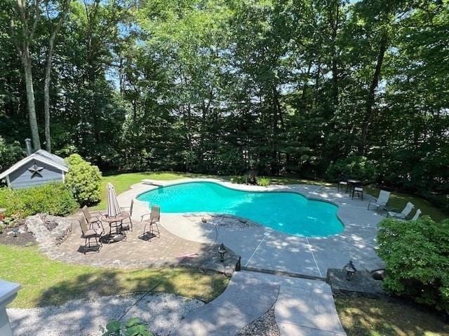 pool with a patio