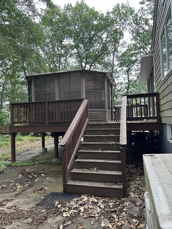 55 Alexander Ave, Dracut, MA 01826 - wooden deck featuring a sunroom and stairs