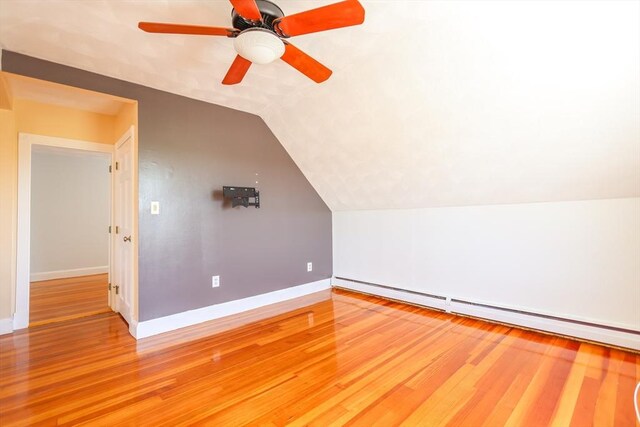2A Hazel St Unit 3, Salem, MA 01970 - additional living space with baseboards, wood finished floors, baseboard heating, and vaulted ceiling