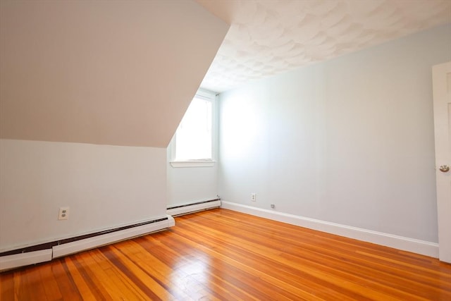 2A Hazel St Unit 3, Salem, MA 01970 - bonus room with a baseboard heating unit, light wood-style floors, and baseboards