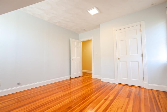 2A Hazel St Unit 3, Salem, MA 01970 - spare room featuring baseboards and light wood-type flooring