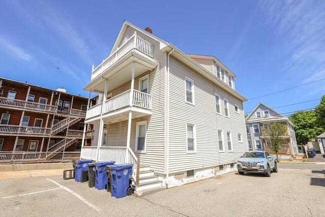2A Hazel St Unit 3, Salem, MA 01970 - view of home's exterior featuring a chimney