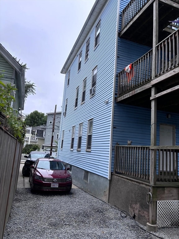 view of property exterior with a balcony