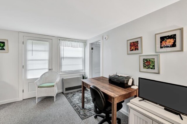 carpeted office featuring radiator