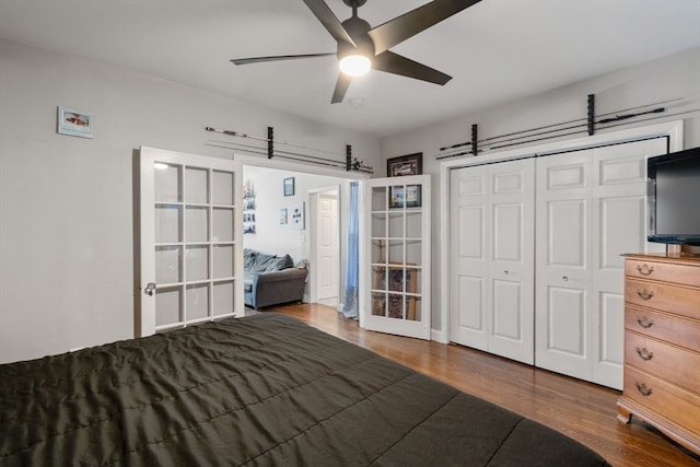 unfurnished bedroom featuring a closet, ceiling fan, and hardwood / wood-style floors