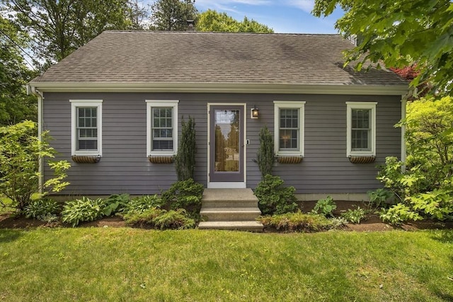 1230 Rte 149, Barnstable, MA 02648 - cape cod-style house featuring a front lawn and roof with shingles