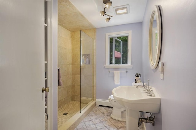 1230 Rte 149, Barnstable, MA 02648 - bathroom featuring a baseboard heating unit, a shower stall, baseboards, tile patterned floors, and toilet