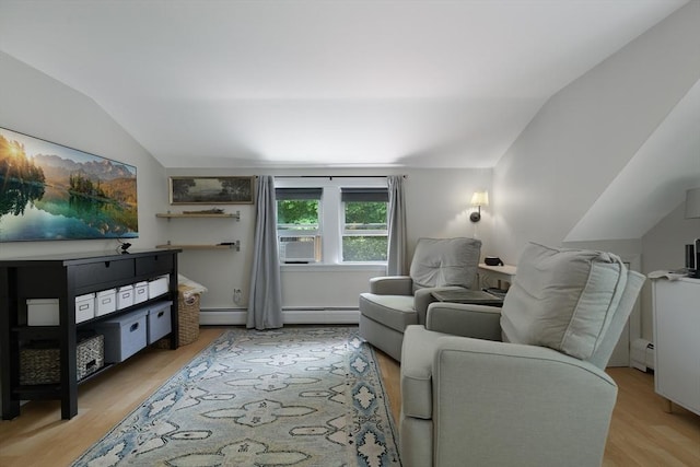 1230 Rte 149, Barnstable, MA 02648 - living room with lofted ceiling, light wood-type flooring, a baseboard heating unit, and cooling unit