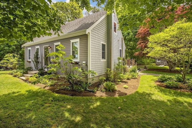 1230 Rte 149, Barnstable, MA 02648 - view of home's exterior featuring a lawn and roof with shingles