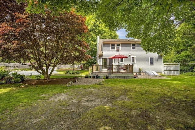 1230 Rte 149, Barnstable, MA 02648 - rear view of house featuring a wooden deck and a chimney