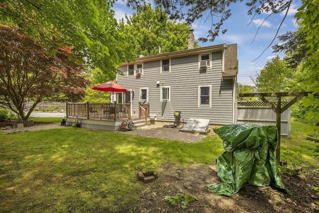 1230 Rte 149, Barnstable, MA 02648 - back of property with a deck and a chimney