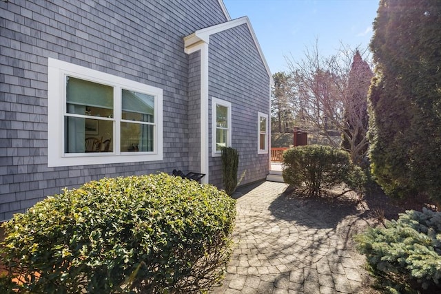 view of side of property featuring a patio