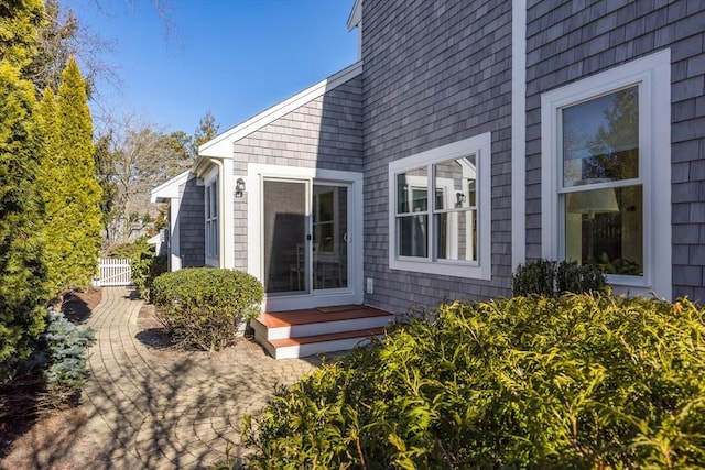 entrance to property featuring a patio area