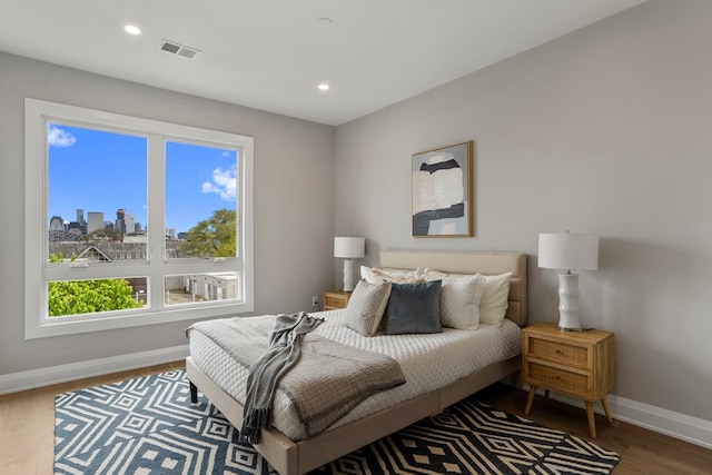 bedroom featuring hardwood / wood-style flooring