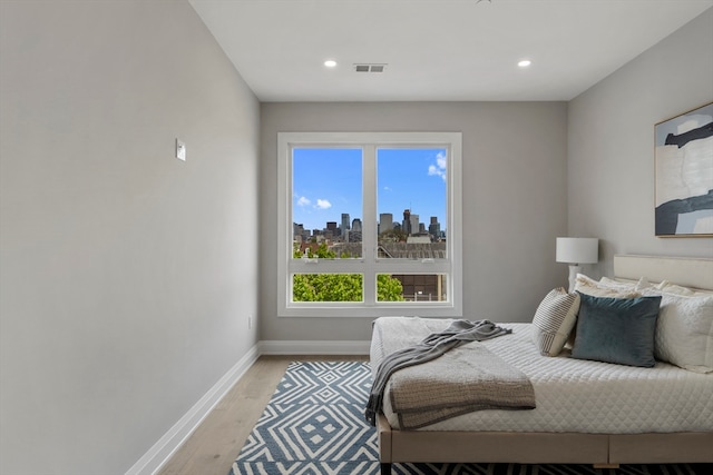 bedroom featuring light wood-type flooring