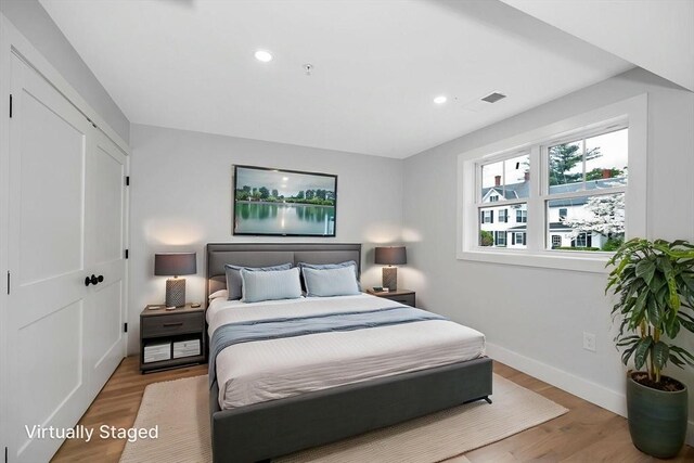 1514 Gorham St Unit 4, Lowell, MA 01852 - bedroom with baseboards, wood finished floors, recessed lighting, and a closet
