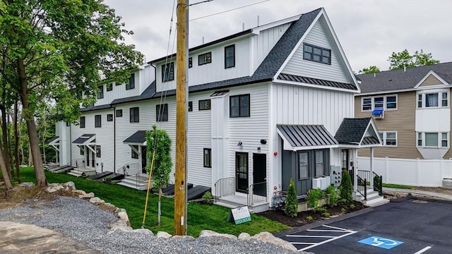 1514 Gorham St Unit 4, Lowell, MA 01852 - view of property featuring entry steps and uncovered parking