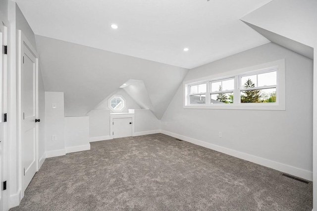1514 Gorham St Unit 4, Lowell, MA 01852 - additional living space with vaulted ceiling, carpet floors, recessed lighting, and baseboards