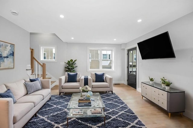 1514 Gorham St Unit 4, Lowell, MA 01852 - living area featuring stairway, light wood finished floors, recessed lighting, and baseboards