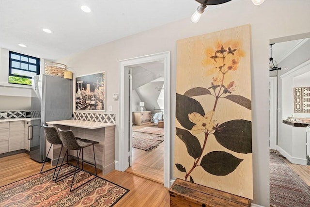 interior space featuring light hardwood / wood-style flooring and built in desk