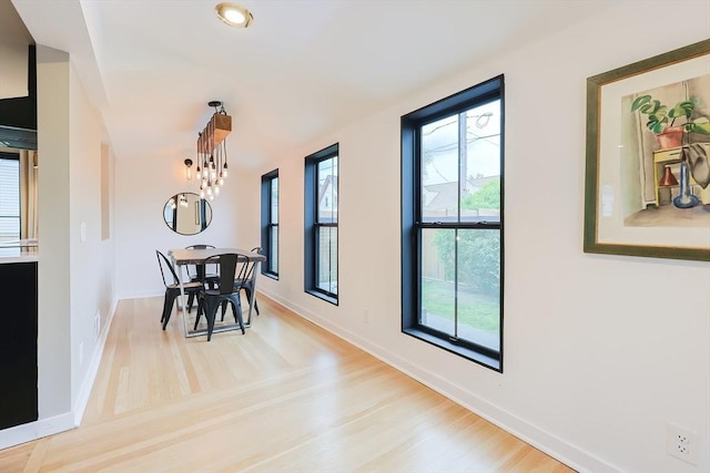18 Carolina St, Medford, MA 02155 - dining room with light wood finished floors, plenty of natural light, baseboards, and recessed lighting