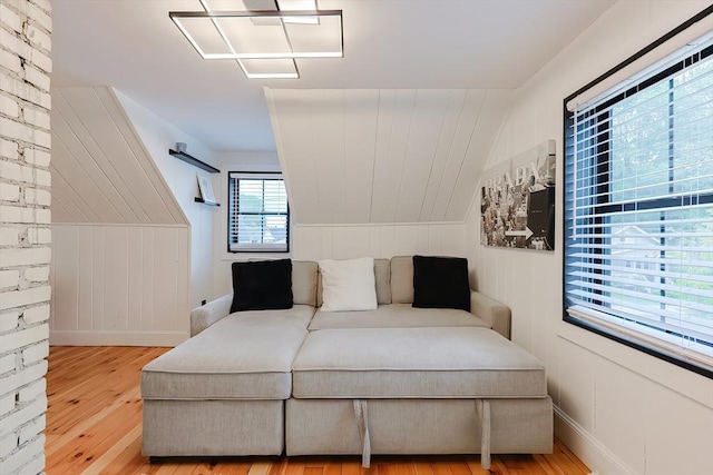 18 Carolina St, Medford, MA 02155 - bedroom with wood-type flooring, baseboards, and lofted ceiling